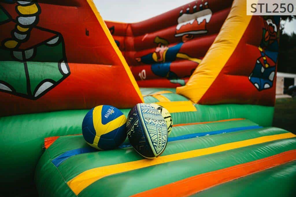 a bunch of inflatables with a ball on top of them