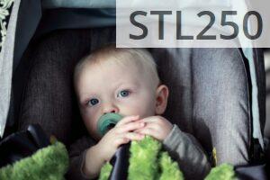 baby on gray stroller